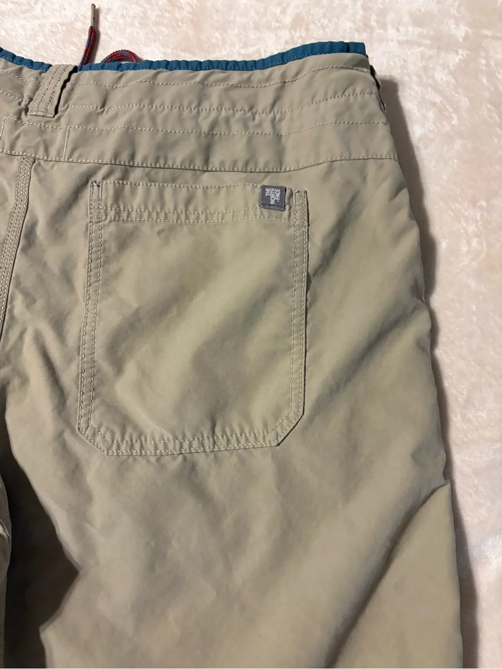 The North Face Khaki Shorts with Teal Trim and Red Drawcord